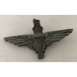 A WWII British parachute regiment plastic economy issue cap badge.