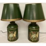 A pair of painted green and gilt tole ware lamp bases with matching shades.