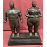 After Fernando Botero, large double bronze figurine mounted on black marble plinth.