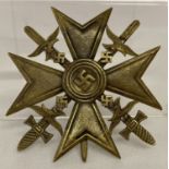 A WWII style Spanish Cross with swords bronze award.