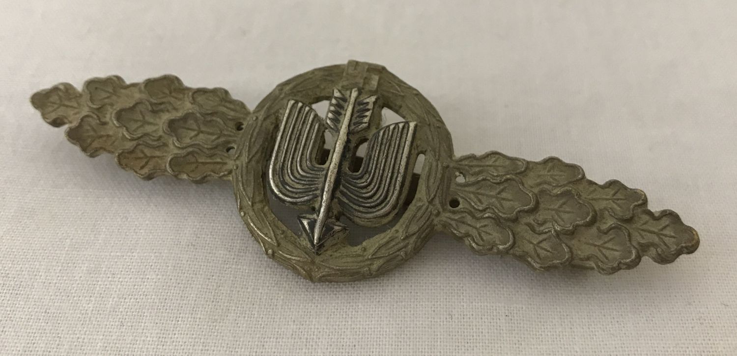 A WWII style German Luftwaffe Day Fighters pin back clasp, silver award.