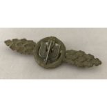 A WWII style German Luftwaffe Day Fighters pin back clasp, silver award.