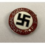 A modern German NSDAP party pin back badge.