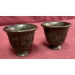 2 small Chinese bronze, footed bowls with signature to underside.
