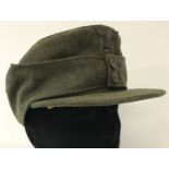 German WWII style army M42 green felt Field/ski cap with early double button design.