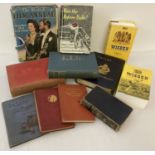 A collection of assorted vintage and antique books.