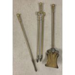 3 vintage brass fireside tools. A poker, a shovel and a pair of tongs.