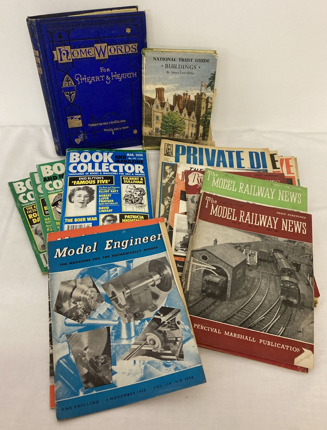 A small collection of vintage and modern books and magazines.