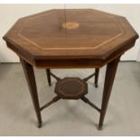 An Edwardian hexagonal occasional table with inlay detail to top.