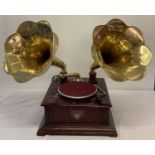 A reproduction wooden cased twin horn gramophone marked "Victrola", complete with handle.