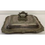 A vintage heavy silver plate lidded tureen with classic decoration to edge and lid.