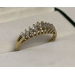 An 18ct gold and diamond cathedral design dress ring. Total diamonds .25ct.