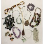 A small collection of glass bead and natural stone jewellery. To include a faceted agate bead