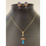 An Egyptian 18ct gold Ankh shaped pendant with matching earrings, set with natural stones.