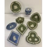 9 pieces of Wedgwood Jasper ware. Comprising 2 trinket boxes and 7 small pin dishes.