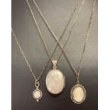 3 vintage and modern silver necklaces.