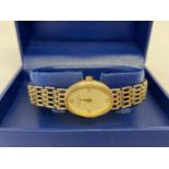 A boxed ladies 9ct gold wristwatch by Rotary. Face set with 4 small diamonds.
