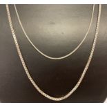 2 silver chain necklaces. A 20 inch fine snake chain together with a 23 inch box chain.