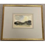 A framed and glazed watercolour of rural landscape signed J.J. Taunton 82.