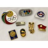 A collection of 8 Russian sports related pin badges.