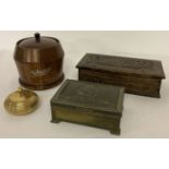 A collection of vintage wooden and brass lidded boxes.