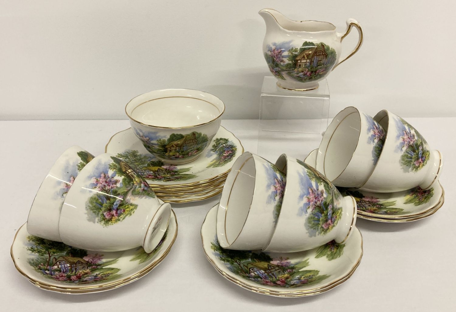 A 6 setting Royal Vale tea set with cottage garden design.