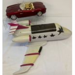 A Bratz Girlz Really Rock! Party plane together with a Bratz metallic red convertible RC car.