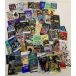 A collection of assorted trading cards empty packets.