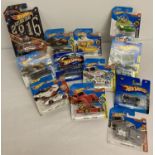 12 Hot Wheels 1:72 scale diecast vehicles, 11 still sealed in original packaging.