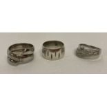 3 silver band style dress rings.