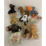 10 Beanie Baby character toys by TY. All with original tags and clear plastic packaging.