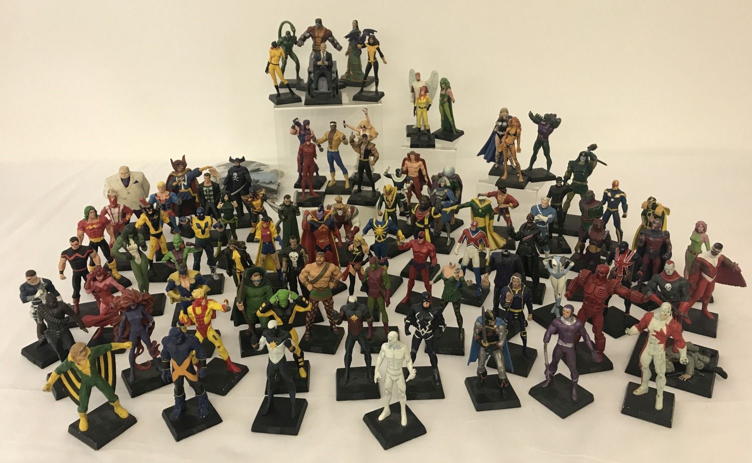 A large collection of 70+ diecast metal, Marvel Comic character figures.