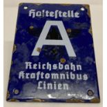 A WWII style German enamel tram stop sign.