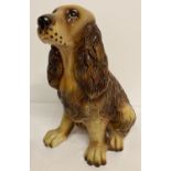 A large vintage plaster figure of a spaniel.