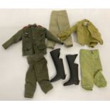 A small collection of vintage Palitoy Action Man military uniform.