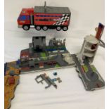 2 x large Hasbro Toys Micro Machines fold out truck playsets.