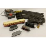A quantity of vintage Triang OO gauge track, trains and accessories.