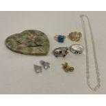 A small collection of modern costume jewellery together with a decorative soapstone heart.