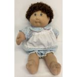 A 1985 Xaviers Roberts Cabbage Patch Doll by Jesmar. In original dress and bloomers.