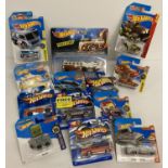 13 Hot Wheels 1:72 scale diecast vehicles. All still sealed in original packaging.