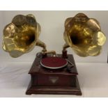 A reproduction wooden cased twin horn gramophone marked "Victrola", complete with handle.