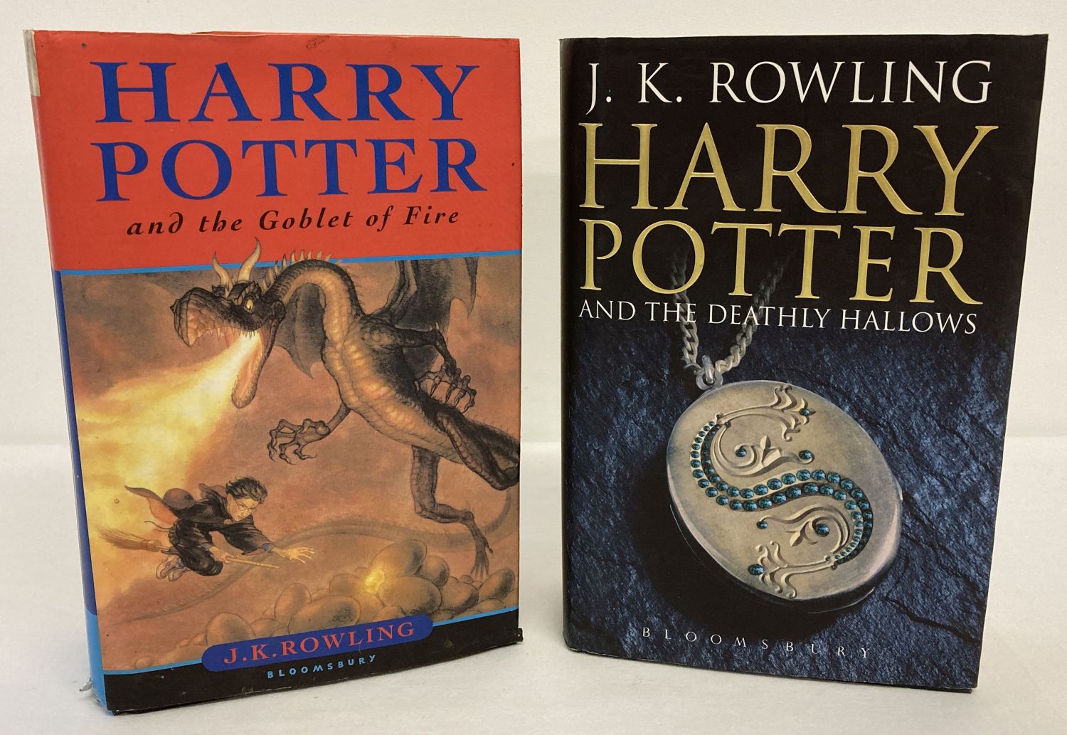 A hardback copy of "Harry Potter and the Goblet of Fire" by J.K. Rowling, printed by Omnia Books.