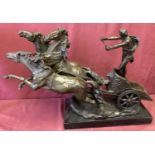 A large marble based bronze figurine of a Chariot racer and 3 rearing horses.