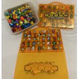 A collection of 220+ vintage Gogo's Crazy Bones figures and 2 carry cases.