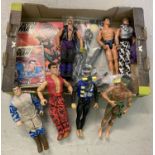 A box of assorted Action Man dolls, toys and accessories.