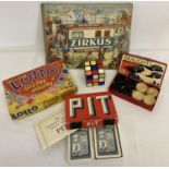 A small collection of vintage games and a German "Zirkus" children's book.