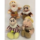 4 plush dwarf characters from Disney's Snow White and the Seven Dwarves.