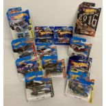 12 Hot Wheels 1:72 scale diecast vehicles. All still sealed in original packaging.