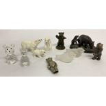A small collection of bear and bird miniature figures.