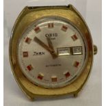 A vintage Oris Star Twen automatic watch with date and day function.